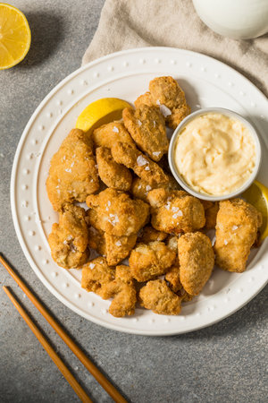 Deep Fried Japanese Chicken Karaage with Mayo and Lemonの写真素材