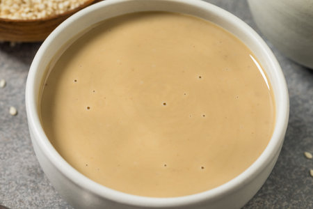 Homemade Organic Tahini Paste Sauce in a Bowlの写真素材