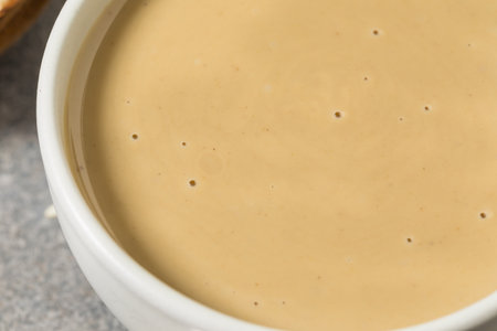 Homemade Organic Tahini Paste Sauce in a Bowlの写真素材