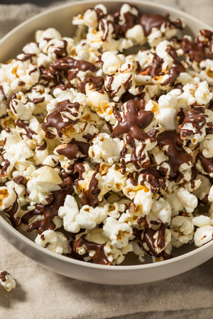 Homemade Chocolate Covered Popcorn with Salt in a Bowlの写真素材