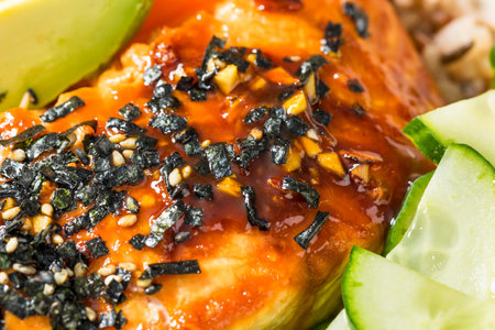 Homemade Japanese Teriyaki Salmon Bowl with Avocado and Cucumberの写真素材