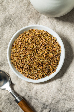 Organic Raw Dry Cumin Seeds in a Bowl