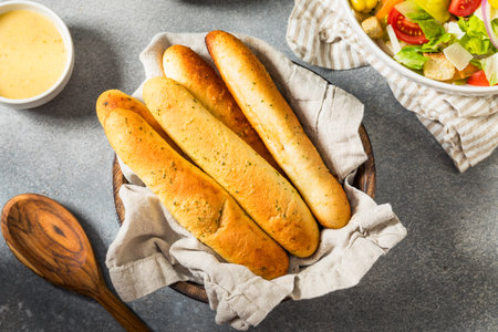 Homemade Italian Soft Garlic Breadsticks with Butter and Salt