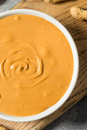Organic Healthy Creamy Peanut Butter in a Bowlの写真素材