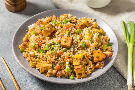 Homemade Asian Tofu Fried Rice with Egg and Carrotsの写真素材