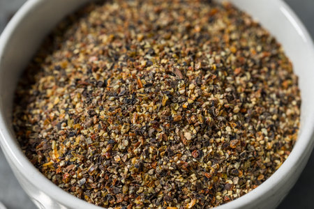 Dry Organic Ground California Pepper Spice in a Bowl