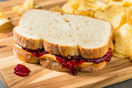 American Homemade Peanut Butter and Jelly Sandwich with Chips