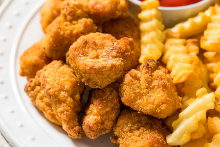 Organic Healthy Fried Chicken Nuggets and French Fries with Ketchupの写真素材