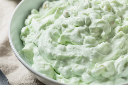 Homemade Sweet Green Fluff Salad with Marshmallows Pineapple and Pistachiosの写真素材