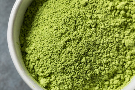 Organic Raw Green Japanese Matcha Powder with a Whisk