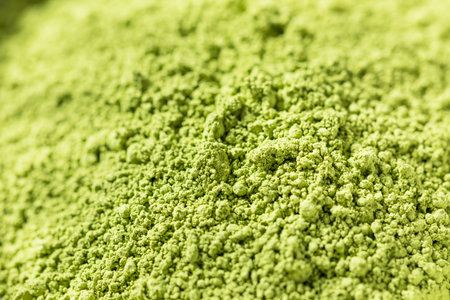 Organic Raw Green Japanese Matcha Powder with a Whiskの写真素材
