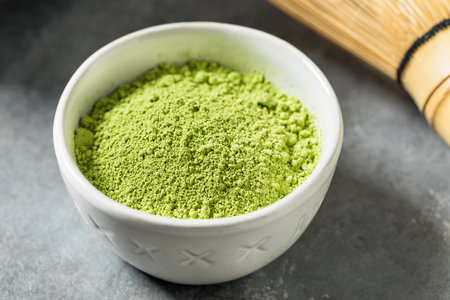 Organic Raw Green Japanese Matcha Powder with a Whisk