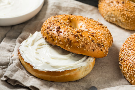 Homemade Everything Bagel with Cream Cheese for Breakfastの写真素材