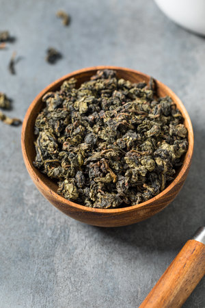 Organic Raw Dry Asian Oolong Tea in a Bowl to Steep