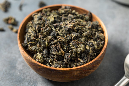 Organic Raw Dry Asian Oolong Tea in a Bowl to Steep