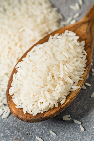 Organic Japanese Basmati Long White Rice in a Spoonの写真素材