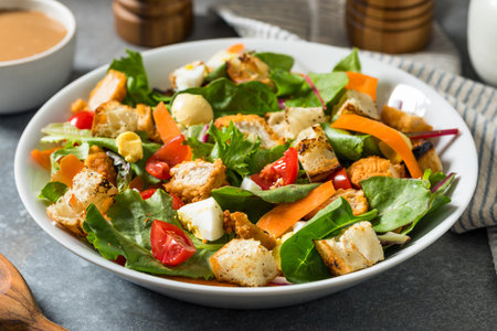 Organic Healthy Italian Salad with Chicken Egg and Tomatoesの写真素材