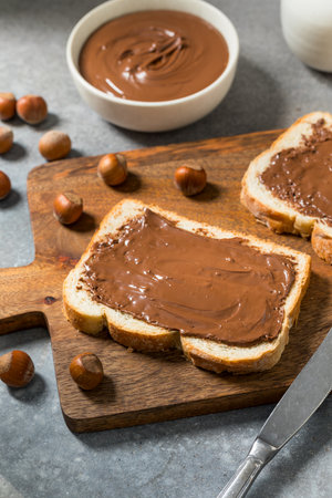 Homemade Sweet Chocolate Hazelnut Toast on Breadの写真素材