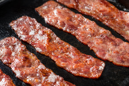 Homemade Cooked Healthy Turkey Bacon in a Pan