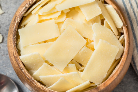 Healthy Hard Shaved Parmesan Cheese in a Bowl for Cookingの写真素材
