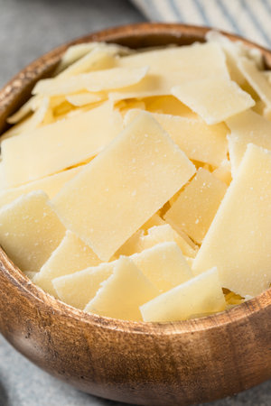 Healthy Hard Shaved Parmesan Cheese in a Bowl for Cookingの写真素材