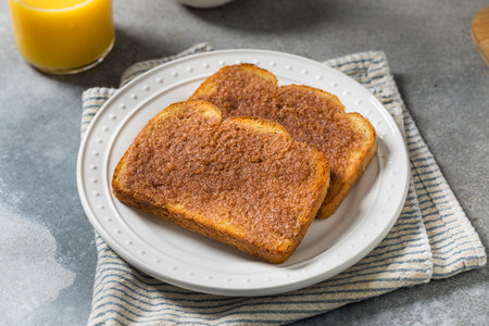 Homemade American Cinnamon Toast with Butter and OJ