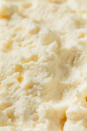 Organic Raw White Mascarpone Cheese in a Bowl for Cooking
