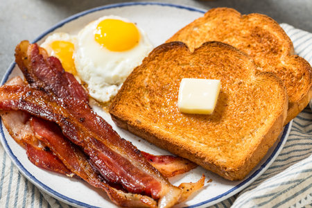 Healthy American Bacon Egg and Toast Breakfast with Orange Juice