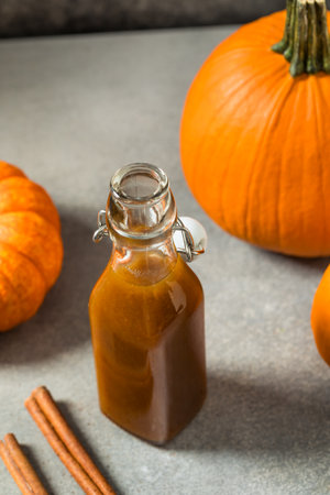 Sweet Homemade Pumpkin Spice Simple Syrup with Cinnamon and Sugarの写真素材