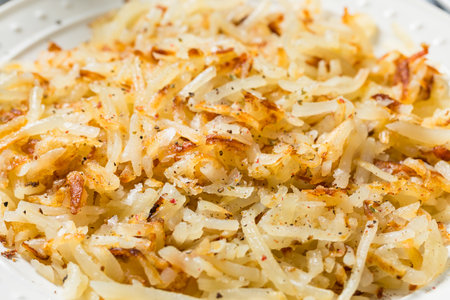 Healthy HOmemade Crispy Shredded Hashbrowns with Salt and Pepperの写真素材
