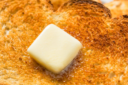 Homemade Buttered Toast for Breakfast with Orange Juice
