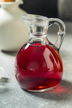 Organic Red Wine Vinegar in a Decanterの写真素材