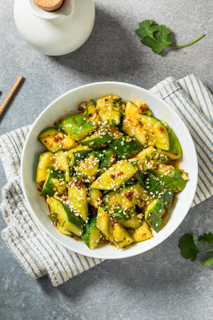 Spicy Homemade Asian Smashed Cucumber Salad with Soy and Sesameの写真素材