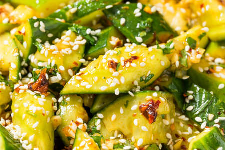 Spicy Homemade Asian Smashed Cucumber Salad with Soy and Sesameの写真素材