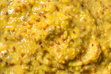 Healthy Organic Spicy Grainy Mustard in a Bowlの写真素材