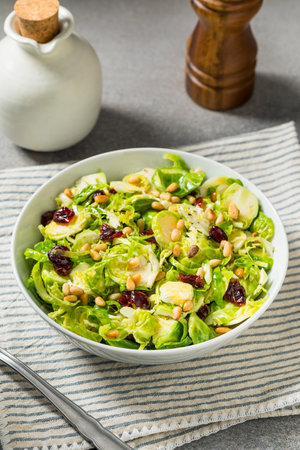 Healthy Fall Shaved Brussel Sprout Salad with Pine Nutsの写真素材