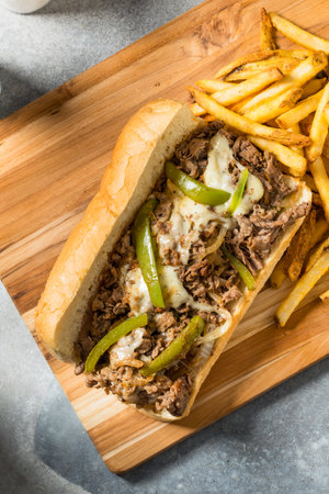 Homemad Philly Cheesesteak Sandwich with Peppers and Onionsの写真素材