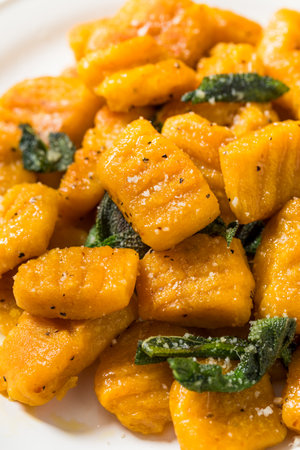 Healthy Homemade Italian Pumpkin Gnocchi Pasta with Butter and Sageの写真素材