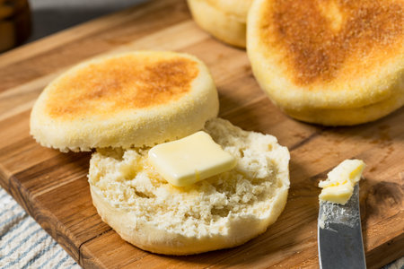 Savory Homemade English Muffins with Butter for Breakfast