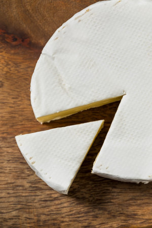 Organic Healthy White Camembert Brie Cheese Cut into Slices