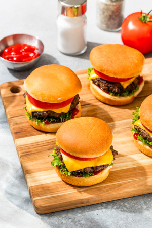 Homemade Savory Cheeseburger Sliders with Tomato and Lettuce