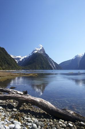 Mitre peak, New-Zealand at Milford Sound with a reflection in the lake.の写真素材