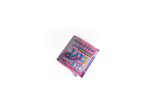 Folded ten 10 Hong Kong dollars or hkd banknote isolated on white background, currency of Hong Kong