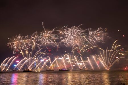 Fireworks in Hong Kong New Year celebration 2017 at Victoria Harbor view from Tsim Sha Tsui promenadeのeditorial素材