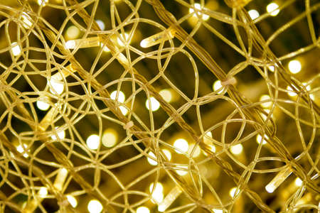 gold abstract light bokeh background in the party and celebration