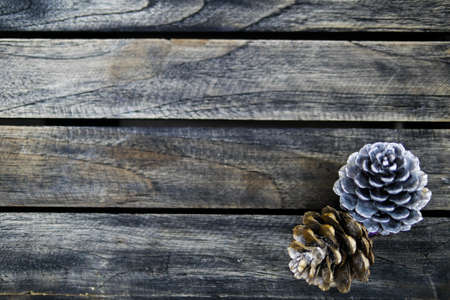 Christmas and New Year background with wine and decoration on dark modern brown wooden board