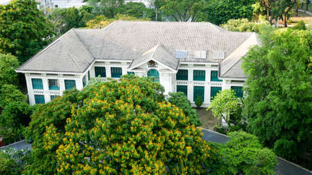BANGKOK, THAILAND - APRIL 20, 2017: The top view of British Embassy that located among the green trees in Bangkok, Thailandのeditorial素材