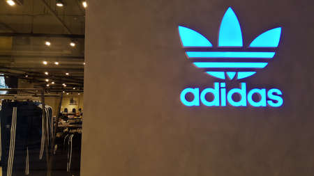 BANGKOK, THAILAND - MAY 4, 2019: Adidas logo in front of official store that located on Iconsiam...