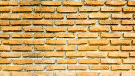Traditional old orange brick wall texture for background and architecture