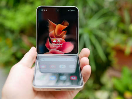 Bangkok, Thailand - August 11, 2021: Samsung officially launches the latest foldable flagship smartphone, the Samsung Galaxy Flip 3.のeditorial素材